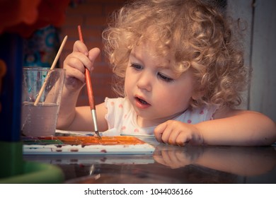 Creative child painter paint concept early child art development