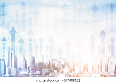 Creative City With Upward Arrows And Daylight. Double Exposure. Financial Growth Concept