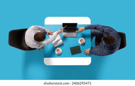 Creative collage. Aerial view of two confident man, entrepreneurs sitting at common table with document and laptop and discussing work tasks. Concept of business lunch, morning meeting, briefing. Ad - Powered by Shutterstock