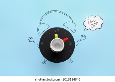 Creative composition with drawn alarm clock and cups on color background