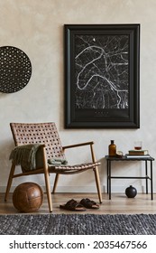 Creative composition of elegant masculine living room interior with mock up poster frame, brown armchair, industrial shelf and personal accessories. Template.   - Shutterstock ID 2035467566