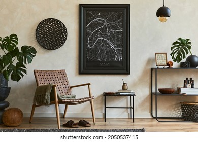 Creative composition of elegant masculine living room interior design with mock up poster frame, brown armchair, industrial geometric shelf and personal accessories. Template. - Shutterstock ID 2050537415