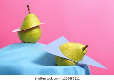 Creative composition with fresh ripe pears against color background