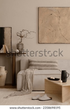Creative composition of living room interior with mock up poster frame, marble coffee table, modular sofa, beige coffee table, wooden consola and personal accessories. Home decor. Template.