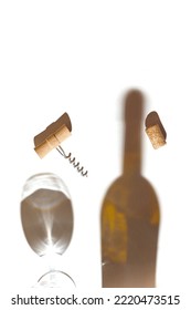 Creative composition made of corkscrew and cork of wine on white background with glass and bottle shadows. Date, party and celebration concept. Top view. Flat lay - Shutterstock ID 2220473515