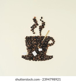 Creative composition of steaming cup of coffee shape made of roasted coffee beans, sugar cubes and golden spoon on light cream background. Realistic look. Contemporary style. Minimal coffee concept.