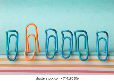 creative concept idea optimistic and pessimistic outlook on life, clips embodying the mood of people, the concept of leader psychology, optimist among pessimists - Shutterstock ID 744190306