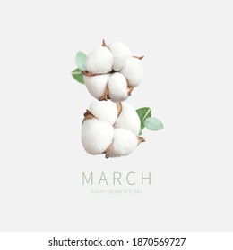 Creative concept for March 8 from cotton. International Women's Day. Number eight from cotton flowers, green twigs of eucalyptus on light background. Flower card, floral composition. Spring, holiday
