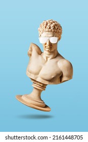Creative concept with old statue in sunglasses on light blue background. Minimal party concept. - Shutterstock ID 2161448705