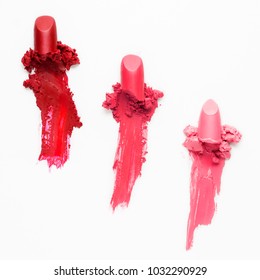 Creative Concept Foto von Kosmetik Uhren Schönheitsprodukte Lippenstift auf weißem Hintergrund.