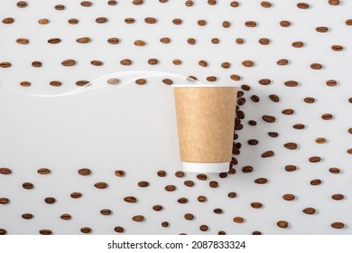 Creative Concept Of Takeaway Coffee. A Paper Cup Among The Coffee Beans With The Effect Of Movement. 

