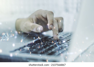 Creative concept of wireless technology and hands typing on laptop on background. Big data and database concept. Multiexposure - Shutterstock ID 2137566867