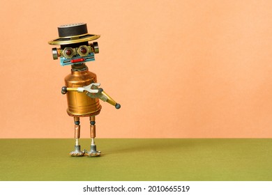 Kreativ gestalteter mechanischer Spielzeugroboter auf pfirsichgrünem Hintergrund. Kopienraum für Text