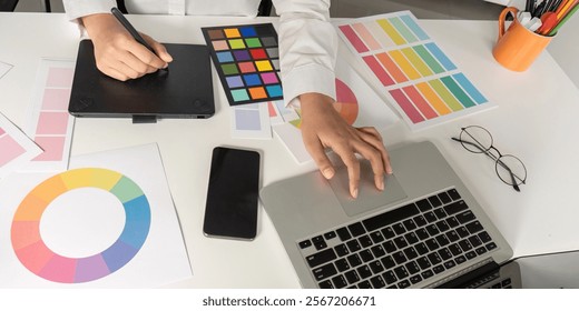 Creative design process in graphic design workspace office environment digital art creation productive viewpoint collaboration concept