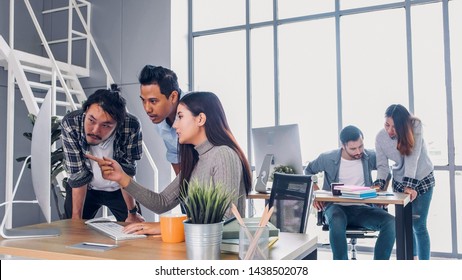 Creative designe team brainstrom branding project with designer team at meeting table with desktop computer.discussion idea in creative office - Powered by Shutterstock