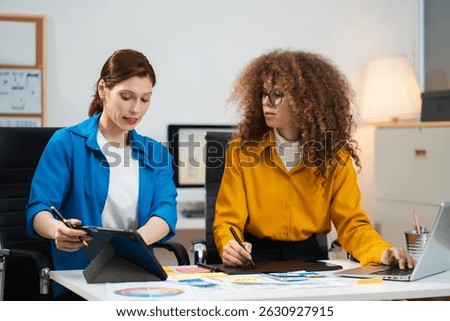Creative digital development agency. developer team brainstorming on project with laptop, smartphone and digital tablet.