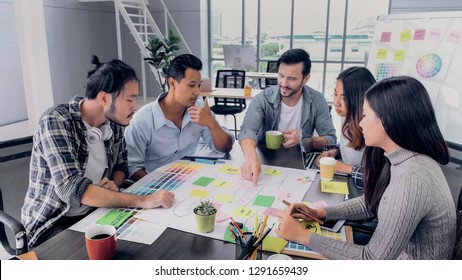 Creative Director Lead Team Brainstroming Of Production Marketing Plan To Communication Brand In Meeting Room At Modern Office.Diversity Asian And Caucasian People Working Togerther