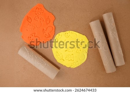 creative diy tutorial showing handmade stamp making with cardboard and glue, used for printing autumn motifs on clay, perfect for craft supply brands, hobby shops, educators, fall content creators