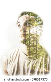 Creative Double Exposure Portrait Of Young Man Combined With Photograph Of Nature