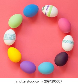 Creative  Easter Composition Of  Colorful Eggs Arranged In Circle.  Flat Lay Minimal Background.Copy Space.