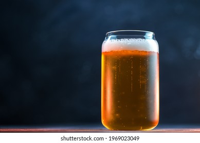 Creative Fashion Beer Glass In The Shape Of A Can. Light Beer Lager On A Dark Table