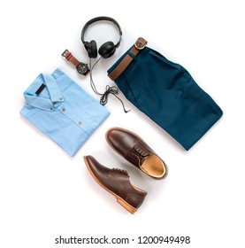 Creative Fashion Design For Men Casual Clothing Set With Brown Shoes , Watch, Belt, Trousers, Shirt And Earphone Isolated On A White Background, Top View