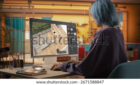 Creative Female Working, Using Computer Software to Choose, Move and Manipulate 3D Furniture in a Cozy Home Project. Student Making an Architecture College Assignment for Interior Design Course