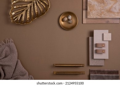 Creative flat lay composition with textile and paint samples, panels and tiles. Stylish interior designer moodboard. Golden and dark beige color palette. Copy space. Template.  - Shutterstock ID 2124955100