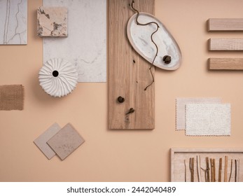 Creative flat lay composition with textile and paint samples, panels and cement tiles. Stylish interior designer moodboard. Light beige and gray color palette. Copy space. Template.