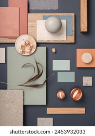 Creative flat lay composition with textile and paint samples, panels and cement tiles. Stylish interior designer moodboard. Blue, beige and brown color palette. Copy space. Template.