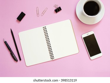 Creative Flat Lay Mockup Design Of Workspace Desk With Blank Notebook, Smartphone, Coffee, Stationery With Copy Space Background

