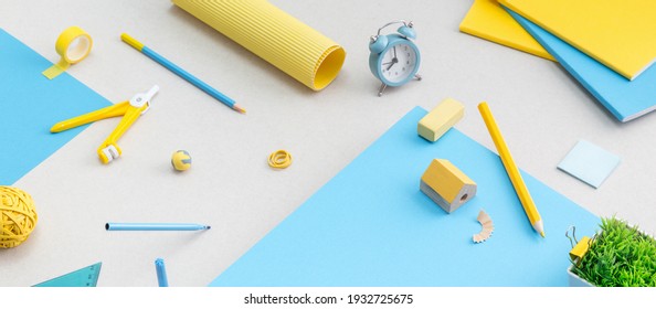 Creative Flat Lay, School Supplies On Blue Table. Top View.