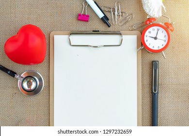 Creative Flat Lay Vintage Red Clock On Office Canvas Table Cloth Top View Background Concept Alarm With Copy Space In Minimal Style, Empty Template For Text, Doctor Workplace Healthcare