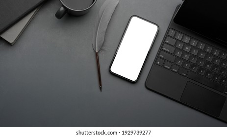 Creative flat lay workspace with smartphone, digital tablet and supplies, clipping path, top view