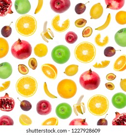 Creative flat layout of fruit, top view. Sliced orange, lemon, plum, banana, pomegranate, apple isolated on white background. Food wallpaper, composition pattern of fresh fruits.