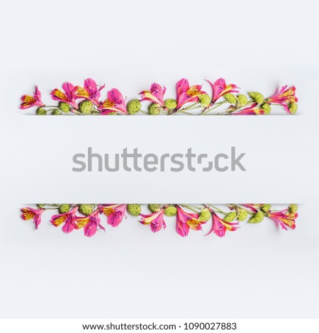 Beautiful exotic flower frame on white