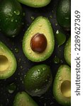 Creative food concept. Fresh avocados avocado green adorned with glistening water droplets seamless. mock up. view. top. flat lay
