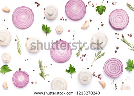 Creative food minimalism. Fresh champignon mushrooms with parsley, peppercorns and purple onion slices on white background, top view