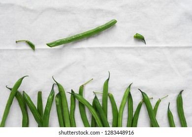 creative fun green beans vegetable background, space for text 
