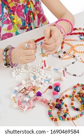 Creative Girl Making Jewelry At Home As A Hobby