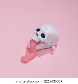 Creative Halloween Layout, Skull With Slime On Pink Background With Shadow. Visual Trend. Fresh Idea. Concept Pop. Trick Or Treat