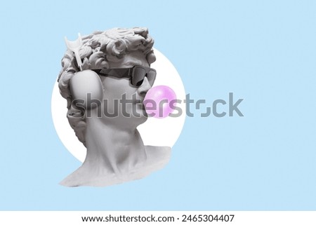 Creative hipster statue with bubblegum bubble, fashionable glasses and headphones on blue background. Earphone. Gypsum statue of David's head, concept. Neoclassic