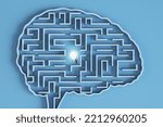 Creative idea and artificial intelligence concept with woman switching on light bulb in labyrinth in form of human brain on blue background