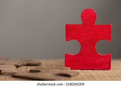 Creative idea and solve the problem concept. Teamwork success strategy - wooden puzzle close up