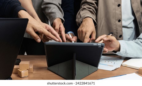 Creative idea teamwork concept. Group of multiethnic diverse team, business partner, project meeting at modern office. Businessman Point to a darts aiming at the target center business.