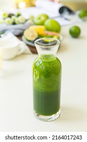 Creative Image. Green Health Drink, Green Apple, Lime, Celery, Cucumber, Kiwi Fruit, Spinach, Avocado, Fresh Mixed Juice - Stock Photo