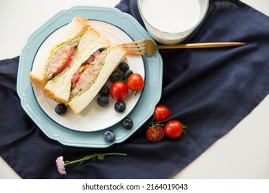 Creative image. Metropolitan Holiday tuna salad sandwiches, family, restaurant, breakfast - stock photo