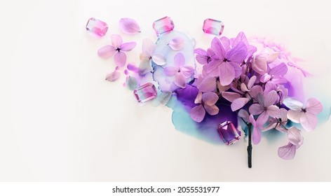 Creative Image Of Pink And Purple Hydrangea Flowers On Artistic Ink Background. Top View With Copy Space