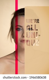 A Creative Image Telling That Each Person Is Unique: A Portrait Of A Beautiful Girl Covered With Two Inserts, One Red Transparent And One Beige With A Transparent Inscription We Are All Unique