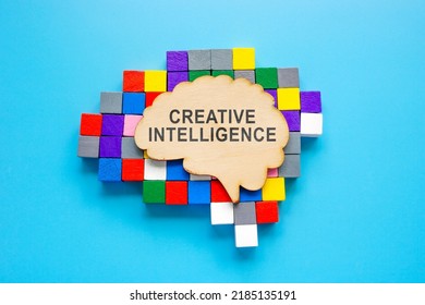 Creative intelligence concept. Brain from wood and colorful cubes.